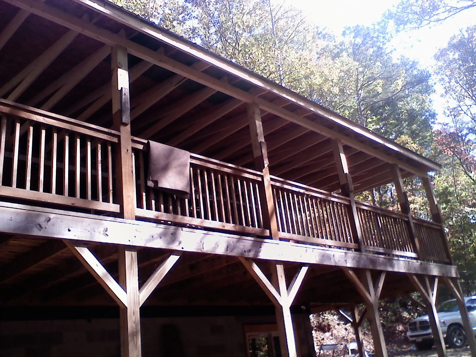Timber framing under a new elevated porch and deck — Roof Leak Repair in Westport by Roofing Brothers